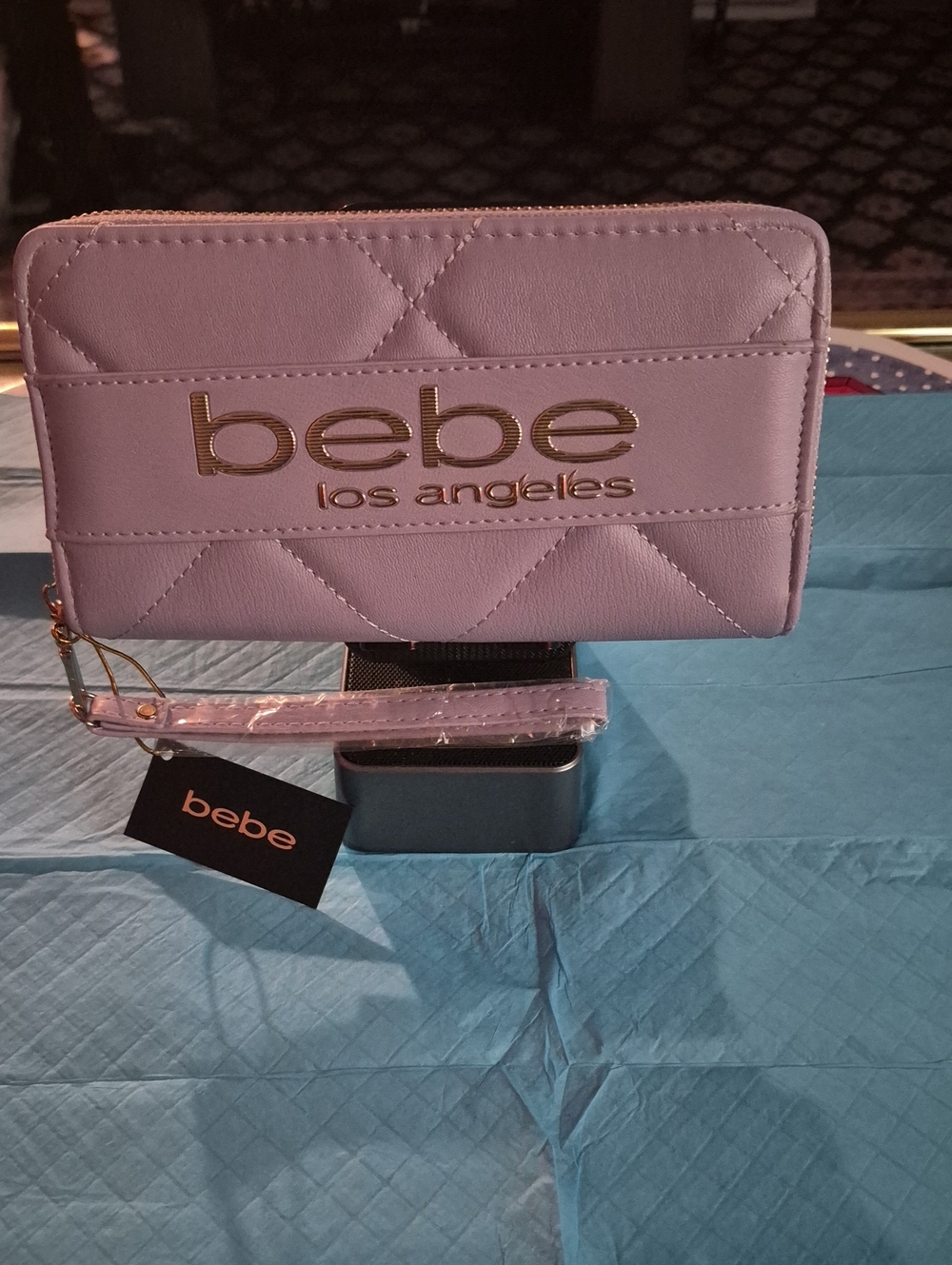 bebe Quilted Wristlet in Purple      Lilac with Gold Logo